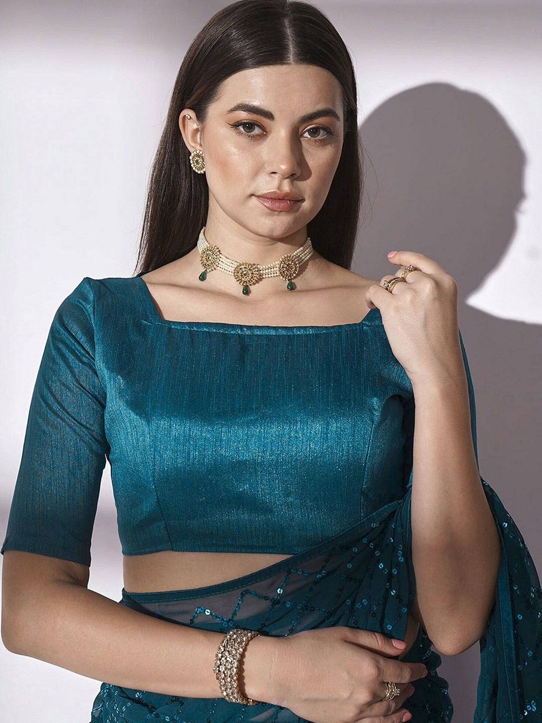 NAINARA Teal Blue Georgette Saree with Sequin Checks Work and Matching Blouse