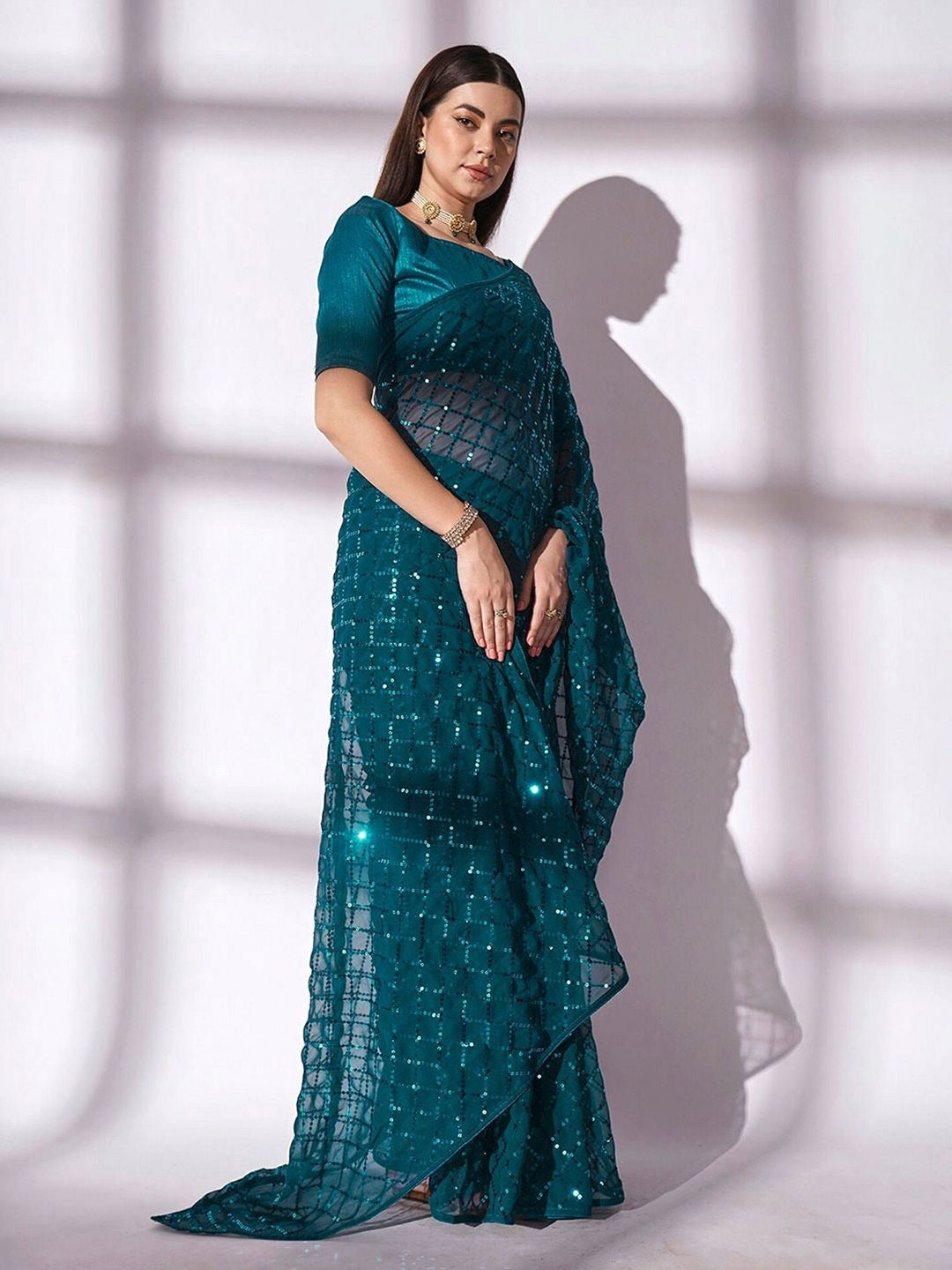 NAINARA Teal Blue Georgette Saree with Sequin Checks Work and Matching Blouse