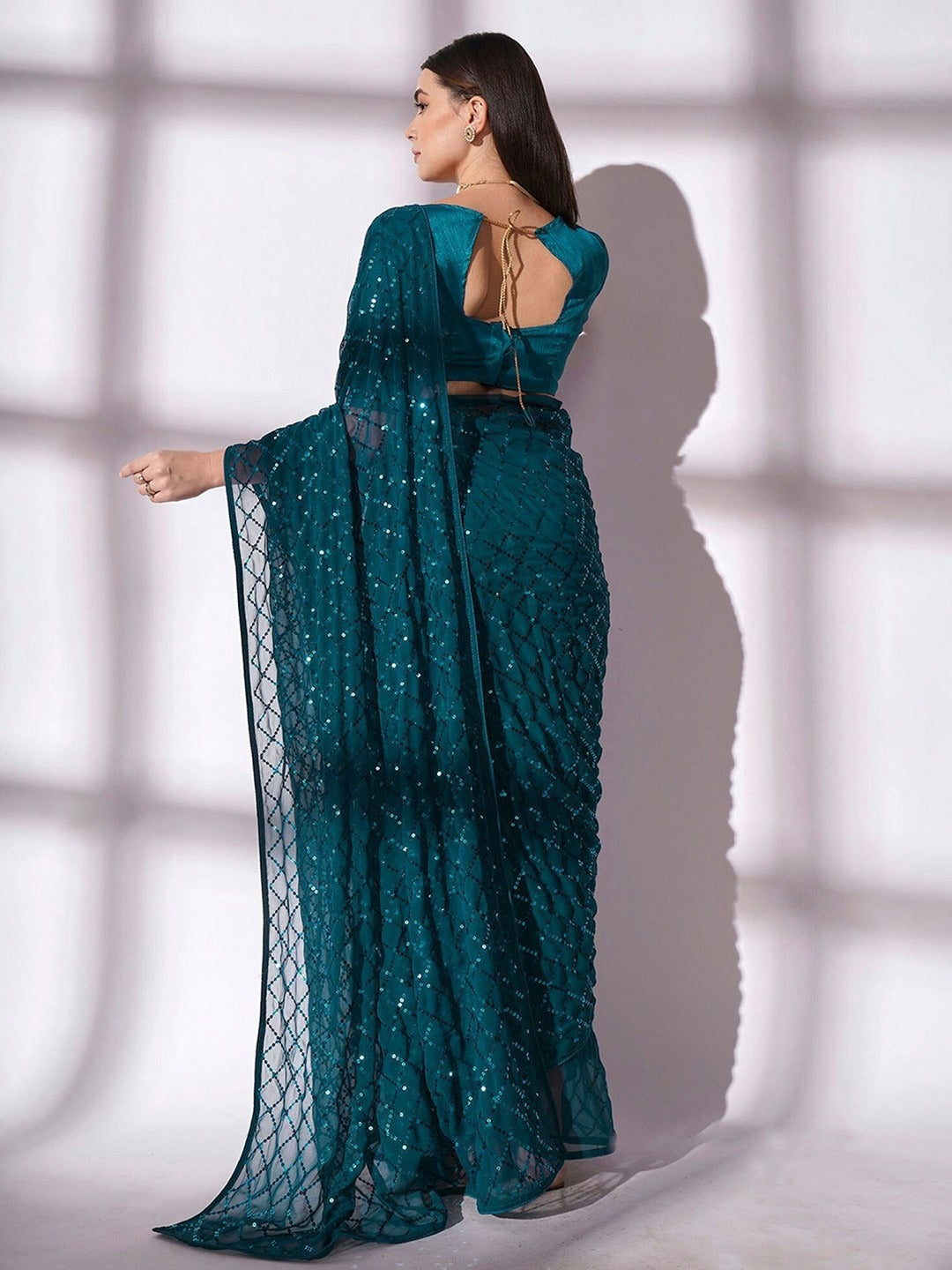 NAINARA Teal Blue Georgette Saree with Sequin Checks Work and Matching Blouse