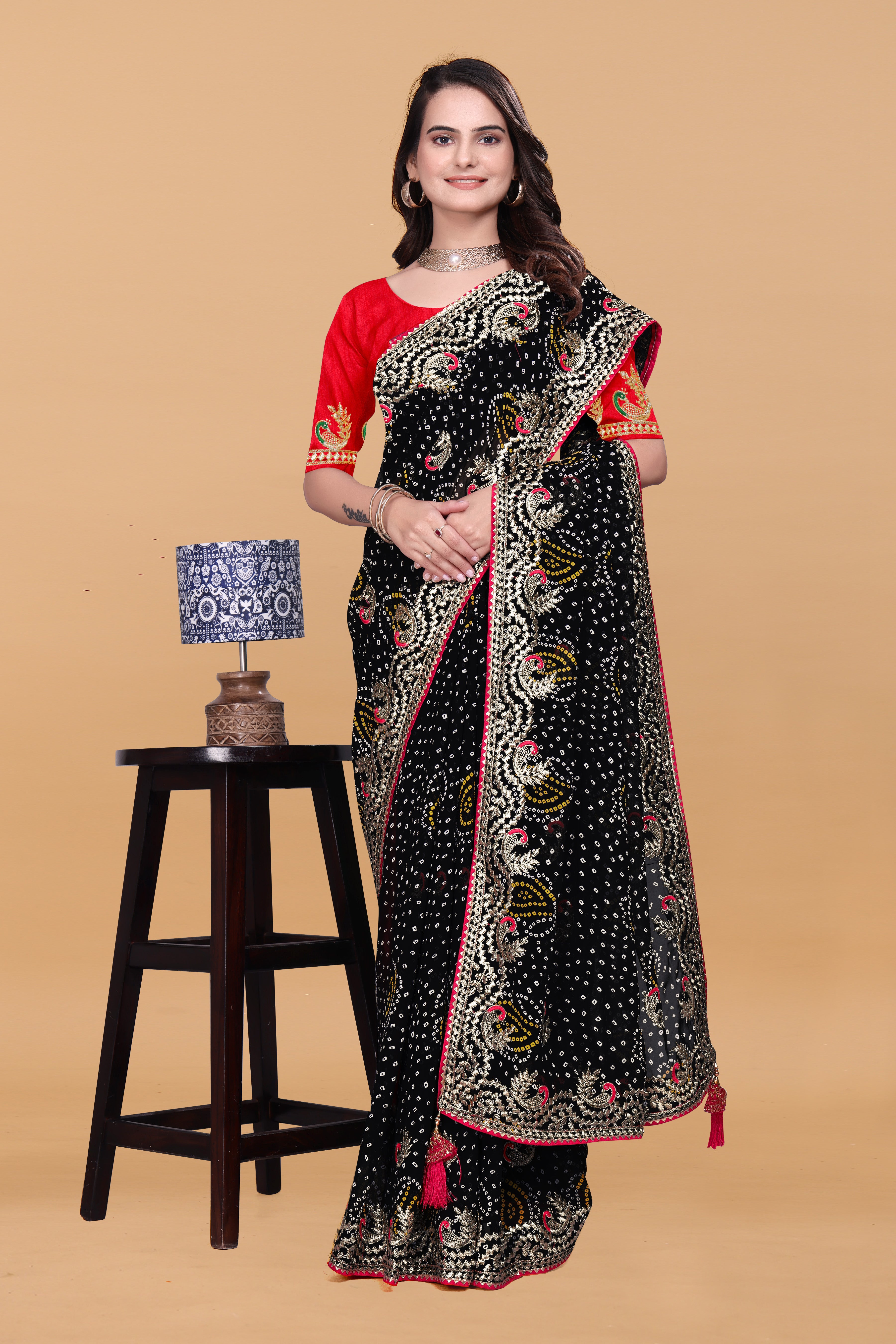 Black Georgette Designer Saree with Embroidered Border & Red Blouse Piece